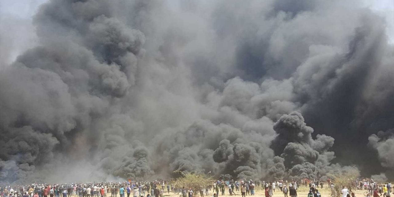 Thousands of Palestinians light huge fires in Hamas-led riots at Israel ...